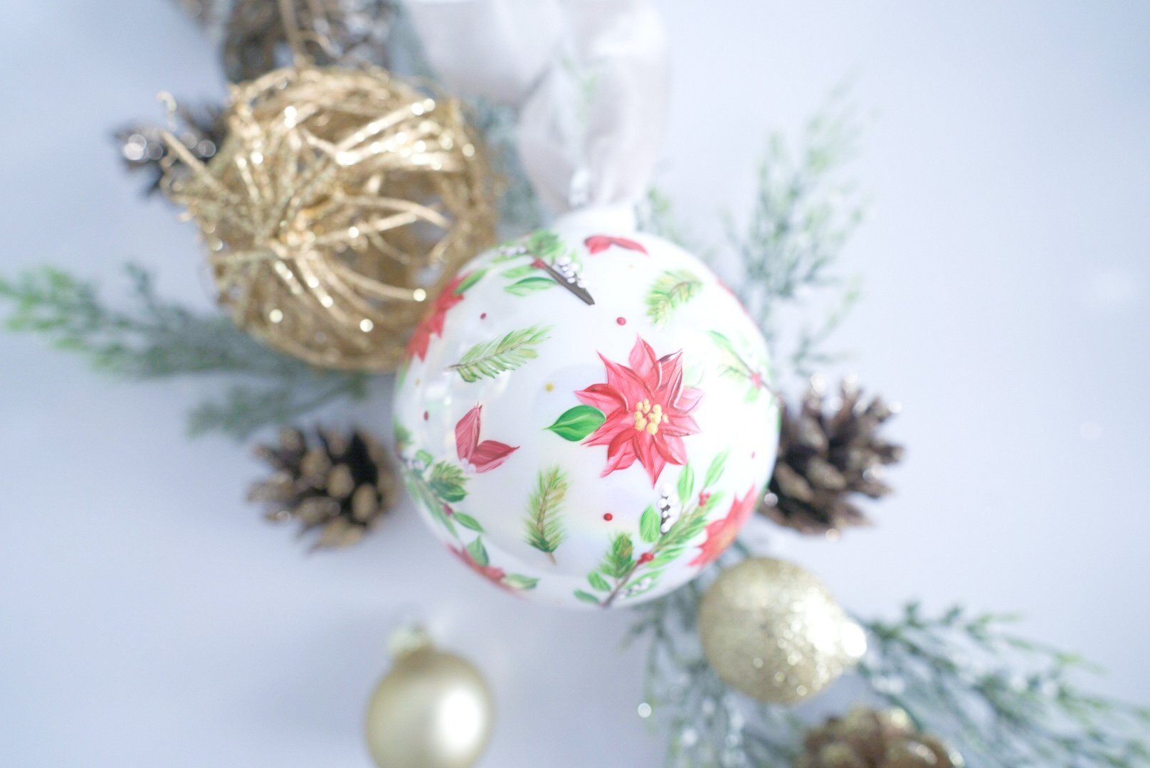 Hand painted winter florals on white iridescent glass ornament