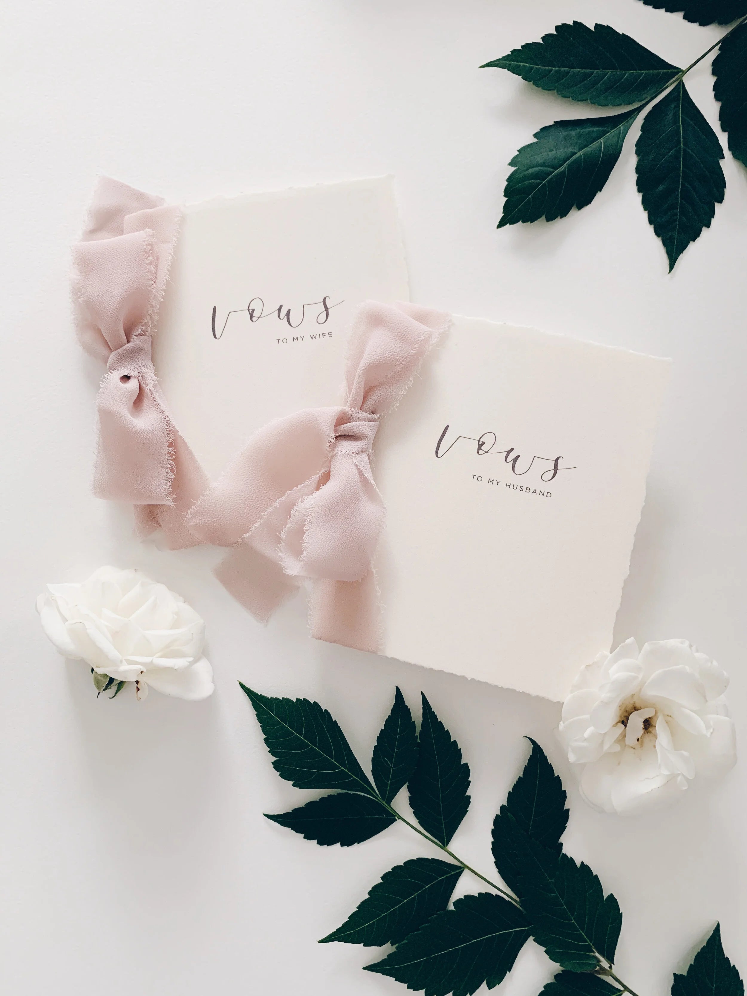 Handmade Vow Books with silk ribbon