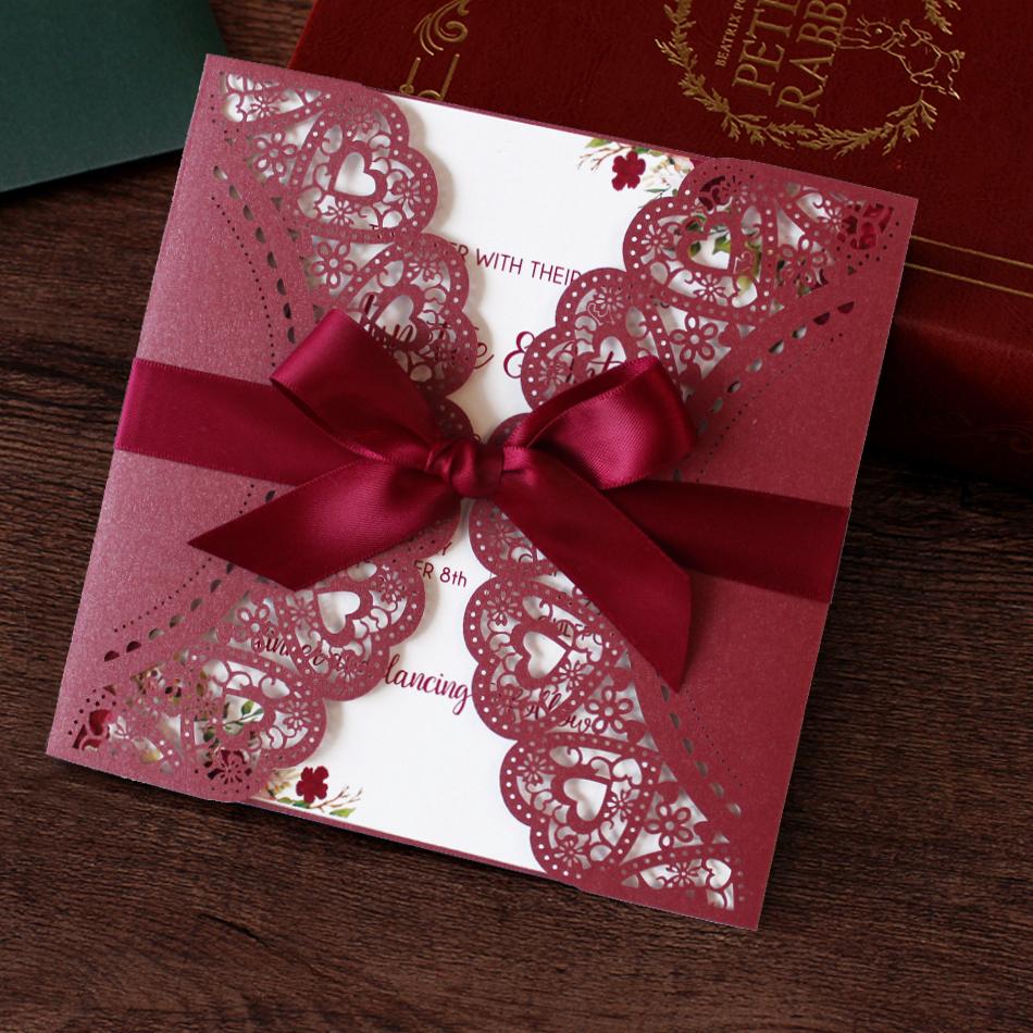 Burgundy Laser Cut Wedding Invitation With Red Ribbon