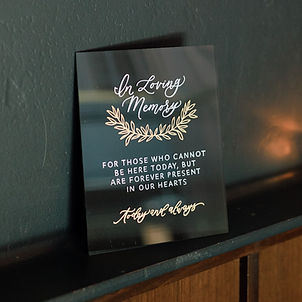 In Loving Memory Sign with Greenery Illustration